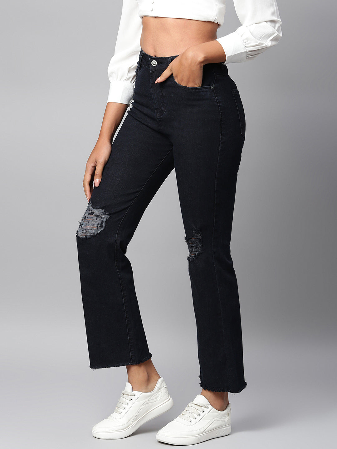 Black straight fit jeans with tattered knee