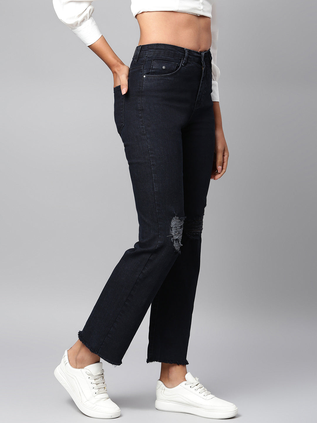 Black straight fit jeans with tattered knee