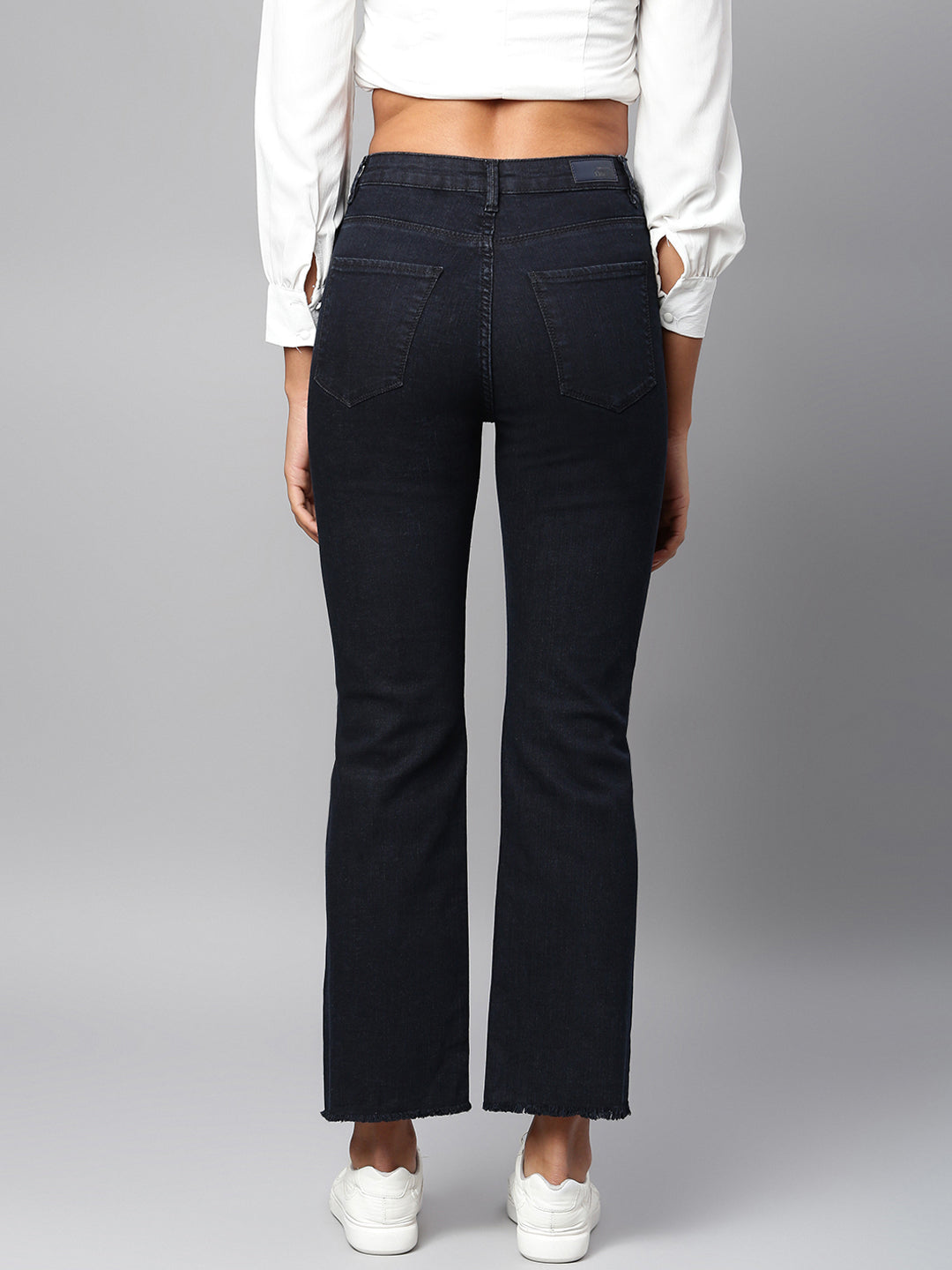 Black straight fit jeans with tattered knee