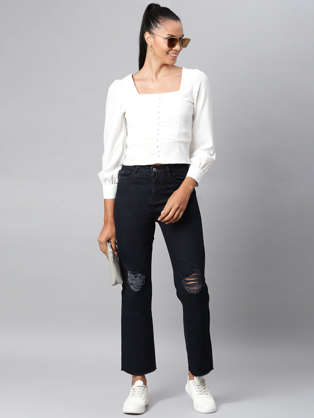 Black straight fit jeans with tattered knee